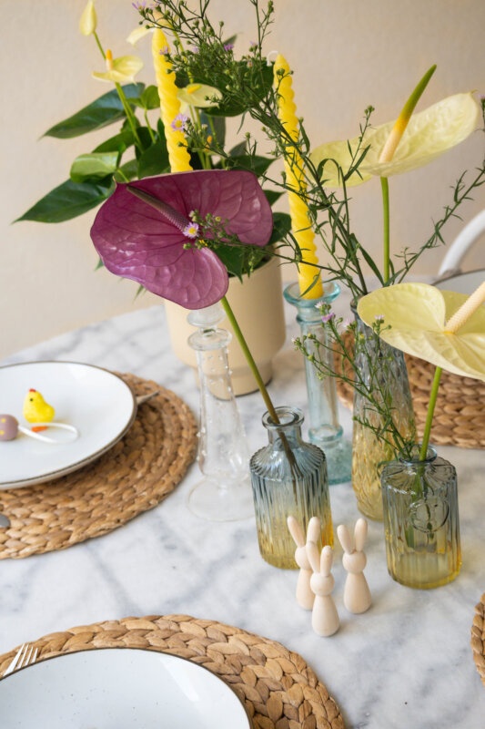 A yellow & purple Easter table with Anthuriums