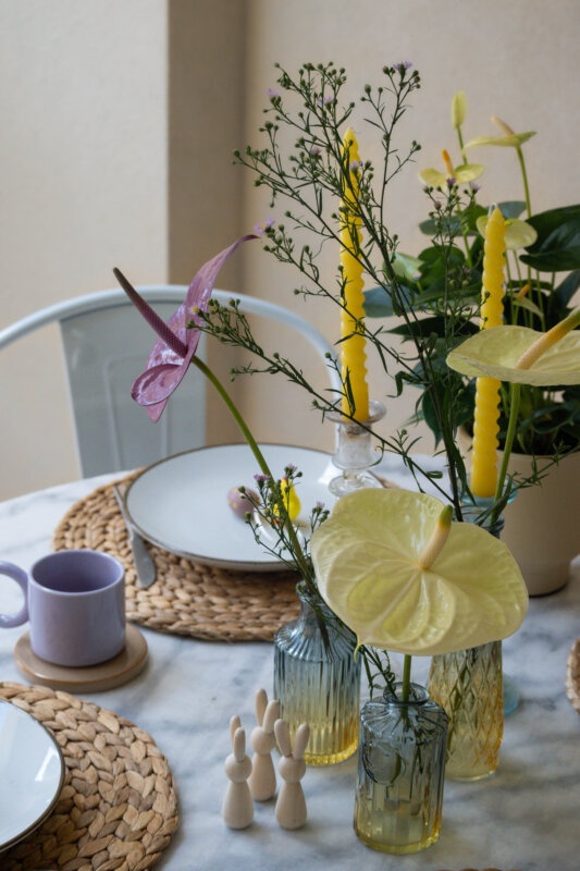 A yellow & purple Easter table with Anthuriums