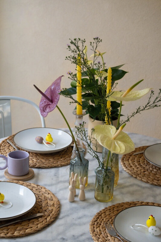 A yellow & purple Easter table with Anthuriums