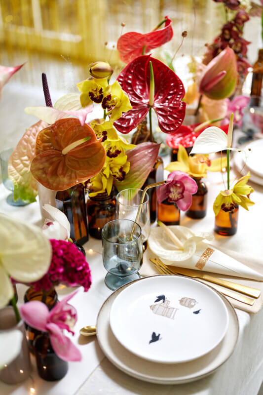 Decemberdecoratie met anthurium en cymbidium